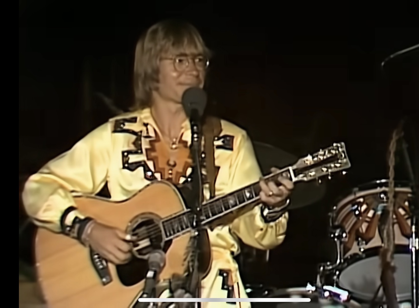 John Denver on stage